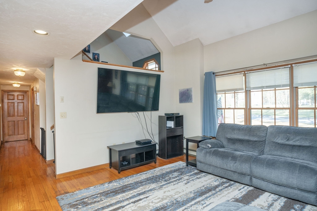 22 Dinahs Way Wareham, MA 02571 - Photo 5 of 42 a living room with furniture and a flat screen tv