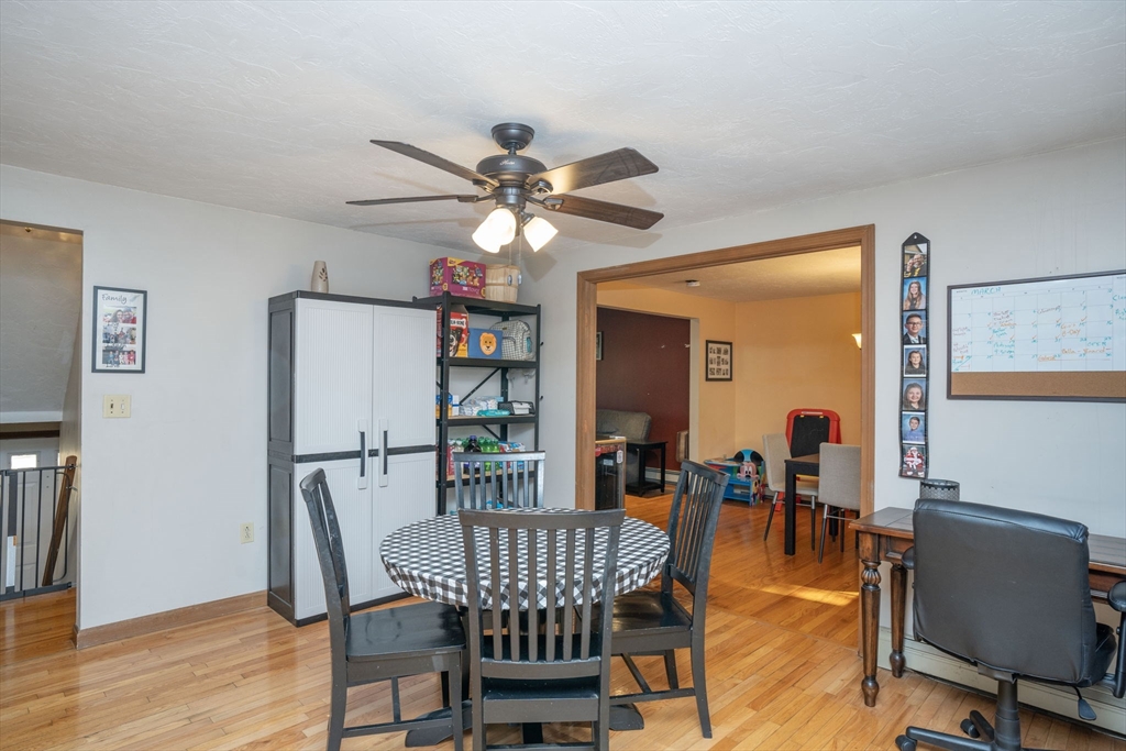 22 Dinahs Way Wareham, MA 02571 - Photo 9 of 42 a view of a dining room with furniture and wooden floor