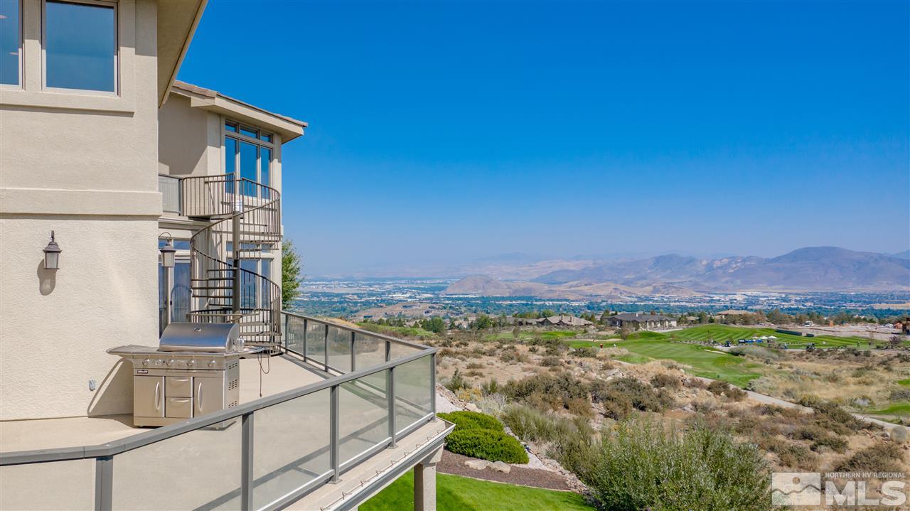 10055 Trailside Court Reno, NV 89511 - Photo 2 of 26 a view of a balcony with an ocean view