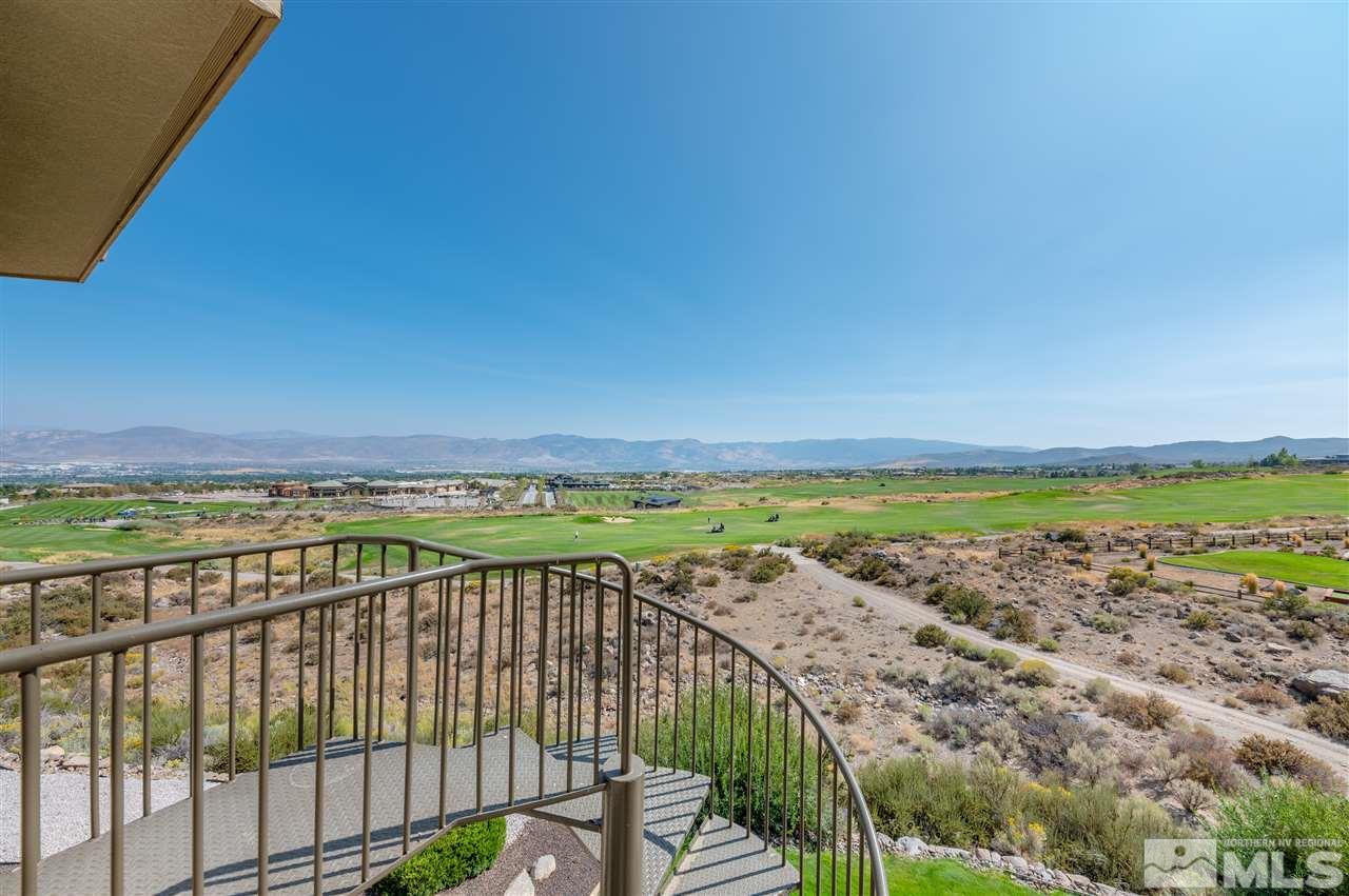 10055 Trailside Court Reno, NV 89511 - Photo 21 of 26 a view of a city skyline from a terrace