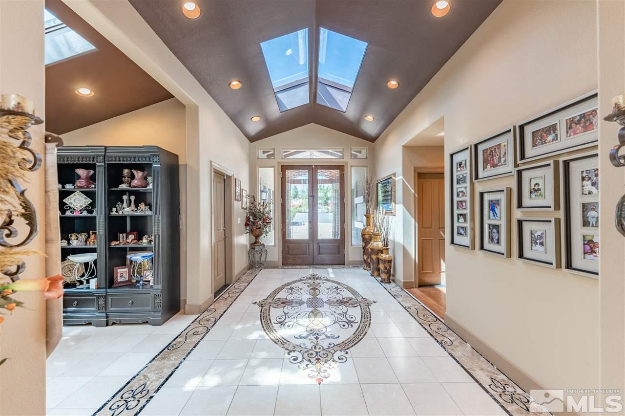 10055 Trailside Court Reno, NV 89511 - Photo 6 of 26 a very nice looking room with a large window