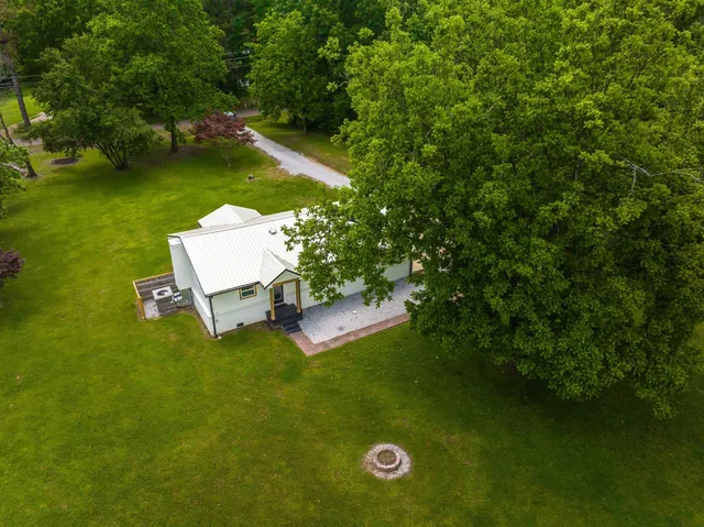 a view of a wooden floor and a yard