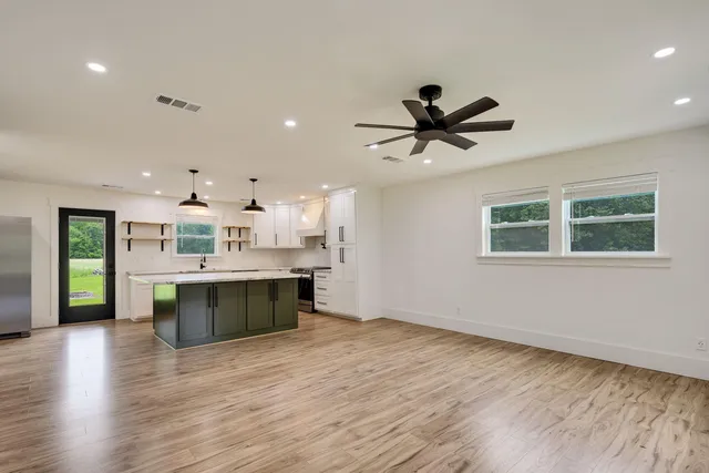 a view of an empty room and window