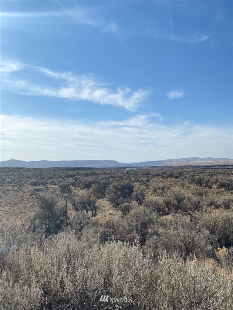 3123 Paint Court Ephrata, WA 98823 - Photo 6 of 8 an aerial view of residential houses with outdoor space