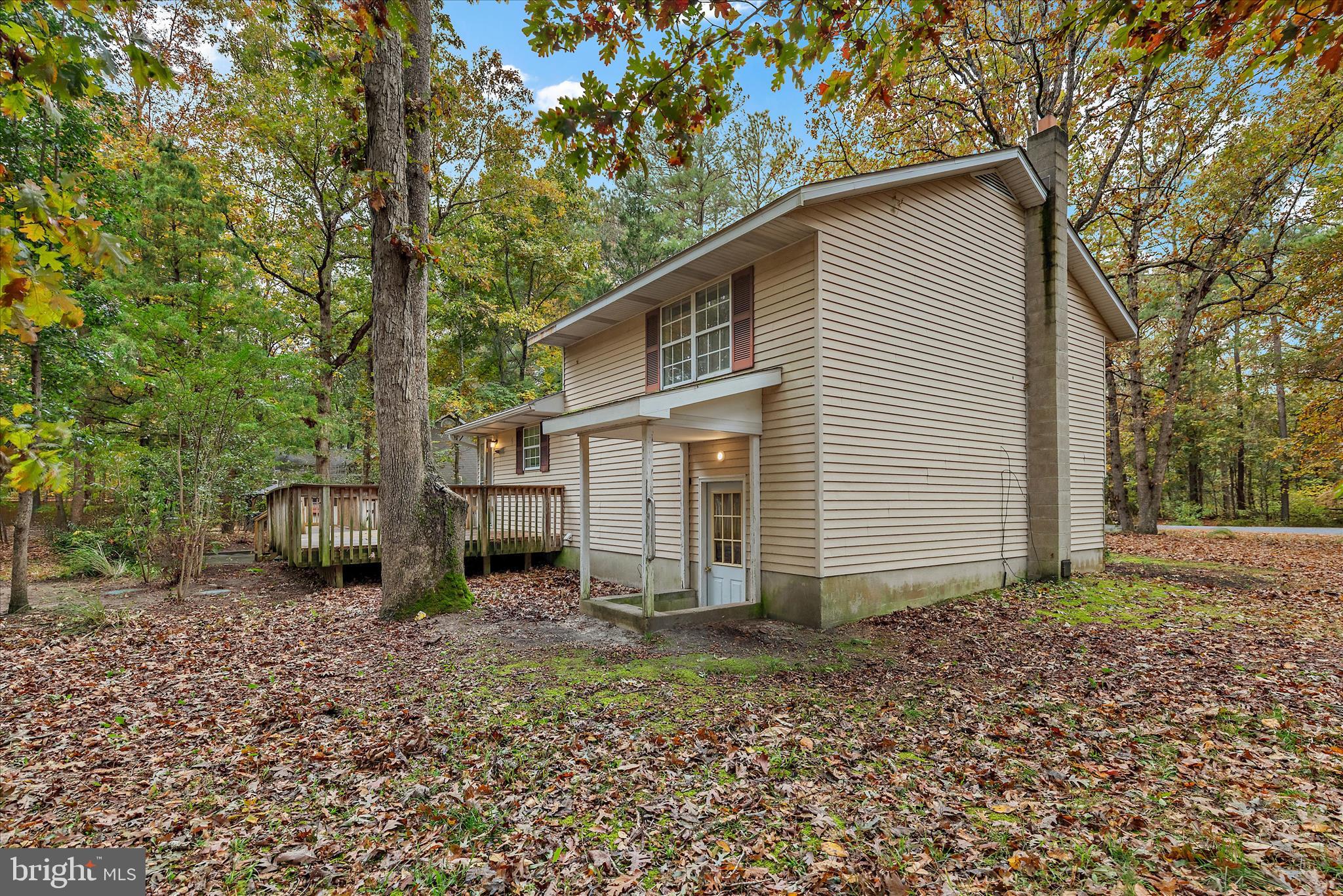 31703 Hickory Manor Road Frankford, DE 19945 - Photo 37 of 49 a front view of a house with a garden