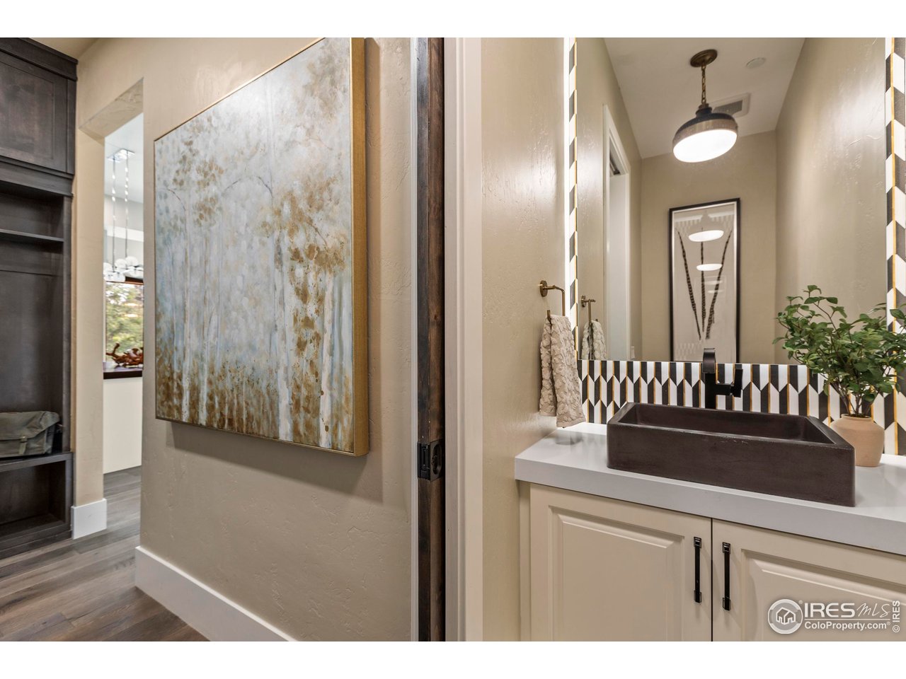 302 North Meldrum Street, Unit 314 Fort Collins, CO 80521 - Photo 11 of 50 a view of a hallway with wooden floor and windows