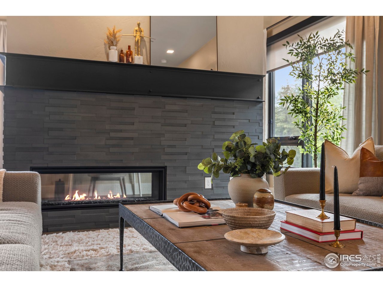 302 North Meldrum Street, Unit 314 Fort Collins, CO 80521 - Photo 13 of 50 a living room with furniture and a fireplace