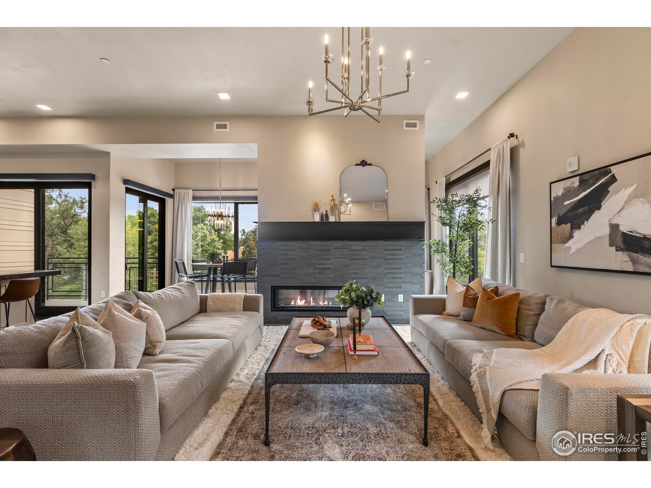 302 North Meldrum Street, Unit 314 Fort Collins, CO 80521 - Photo 15 of 50 a living room with furniture and a large window