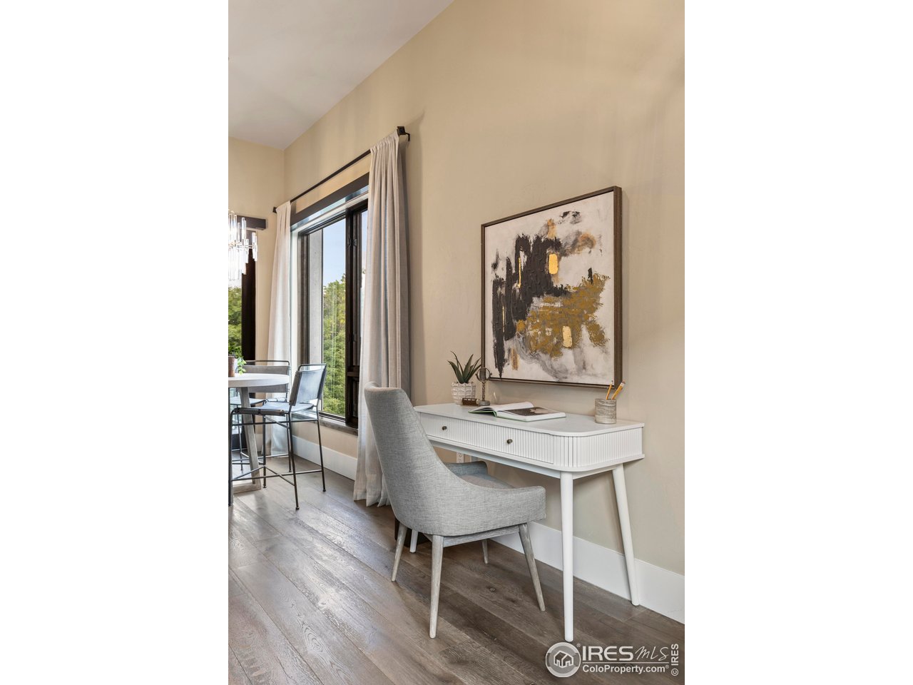 302 North Meldrum Street, Unit 314 Fort Collins, CO 80521 - Photo 18 of 50 a room with furniture and wooden floor