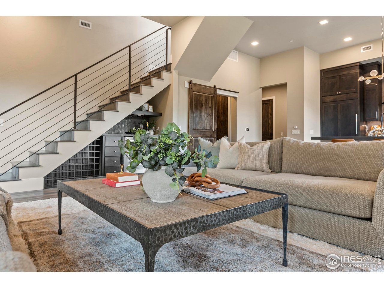 302 North Meldrum Street, Unit 314 Fort Collins, CO 80521 - Photo 19 of 50 a living room with furniture and a potted plant