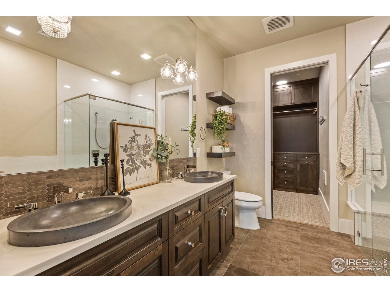 302 North Meldrum Street, Unit 314 Fort Collins, CO 80521 - Photo 31 of 50 a bathroom with a sink a toilet and shower