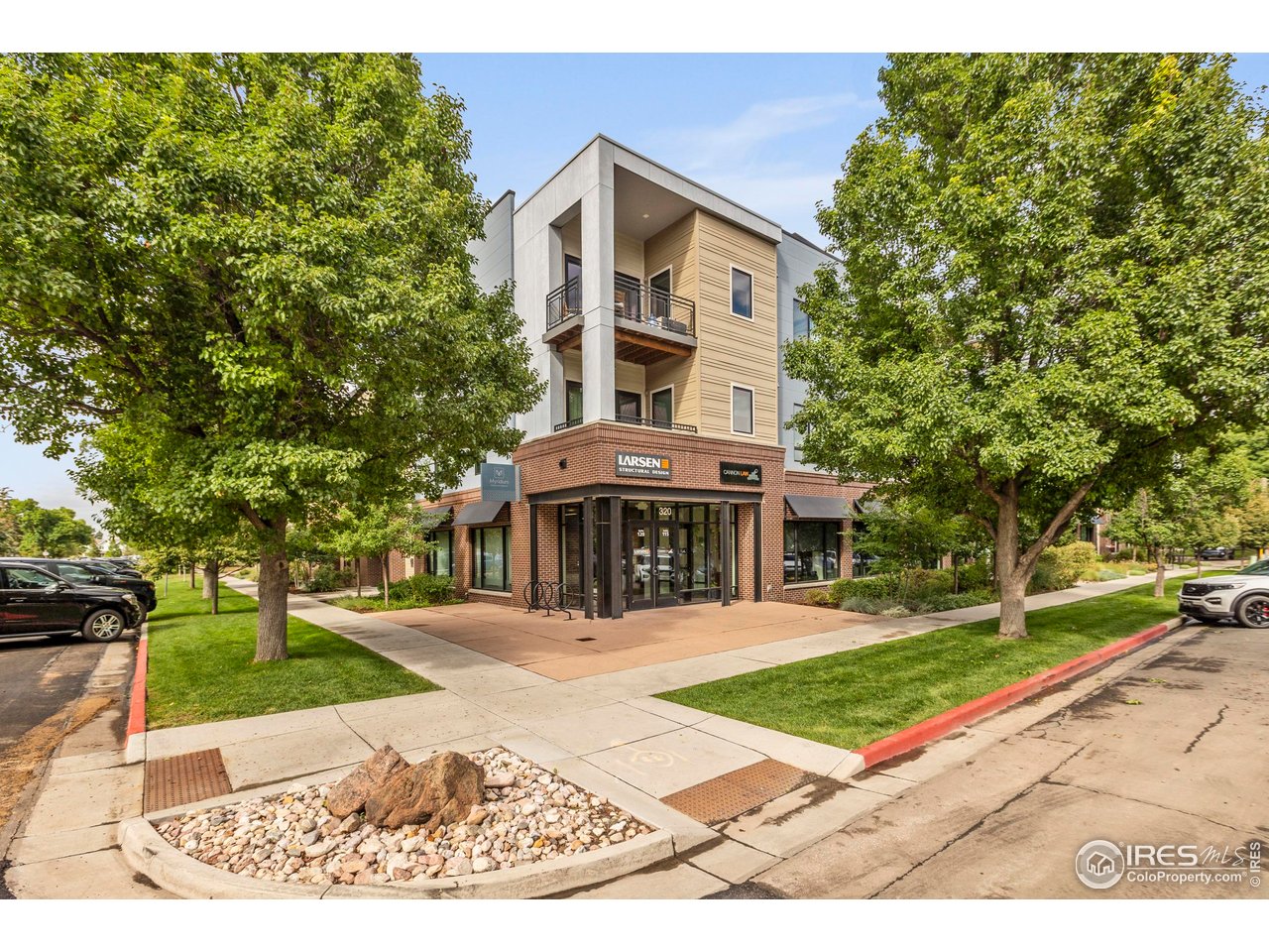 302 North Meldrum Street, Unit 314 Fort Collins, CO 80521 - Photo 4 of 50 a front view of a house with a yard