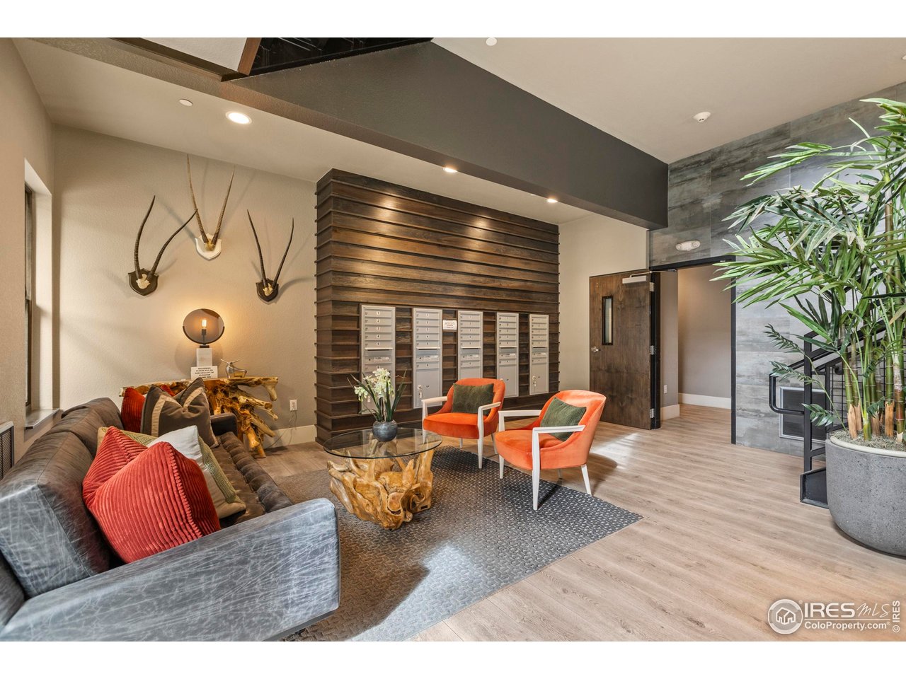302 North Meldrum Street, Unit 314 Fort Collins, CO 80521 - Photo 6 of 50 a living room with furniture and wooden floor