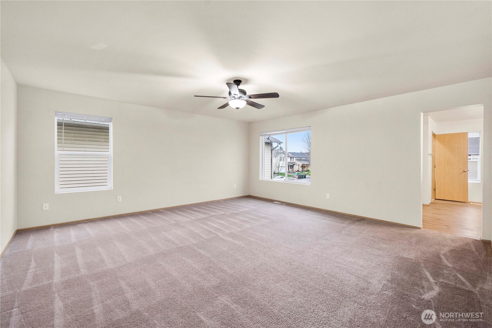 14942 99th Way Southeast Yelm, WA 98597 - Photo 23 of 37 wooden floor in an empty room with a window