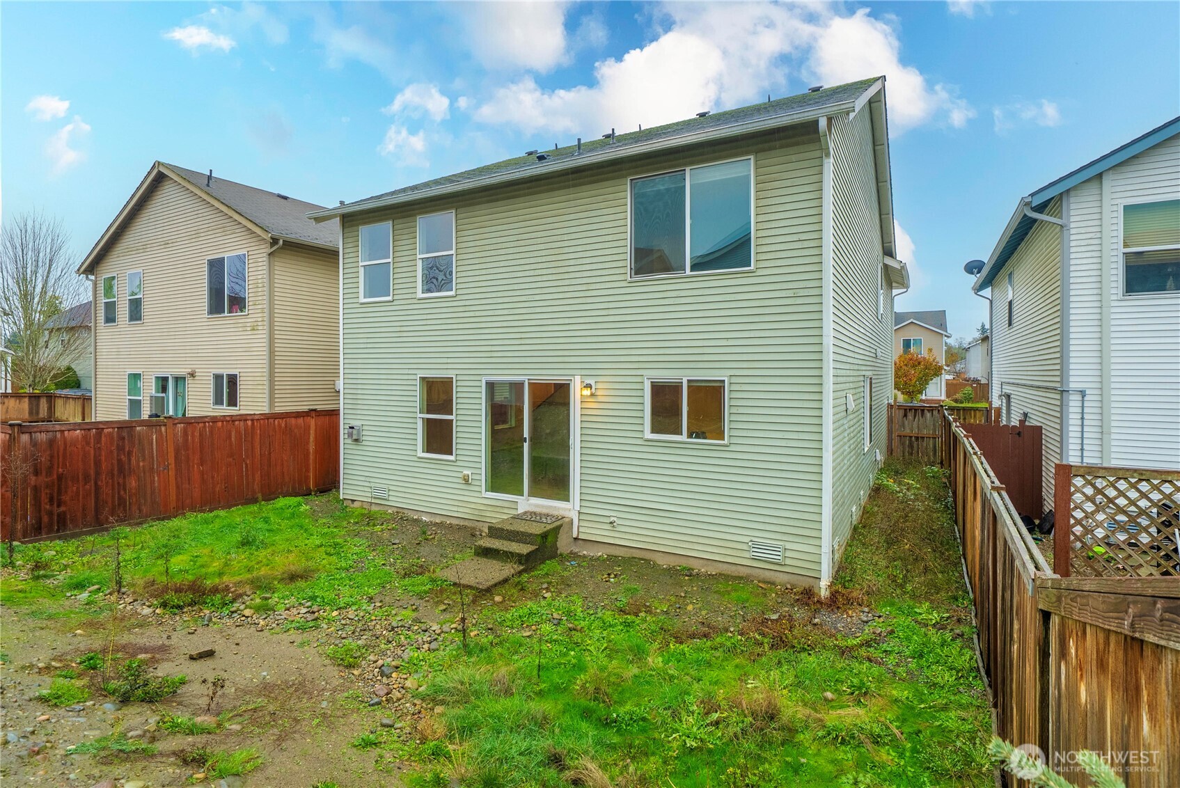 14942 99th Way Southeast Yelm, WA 98597 - Photo 36 of 37 a backyard of a house with seating space