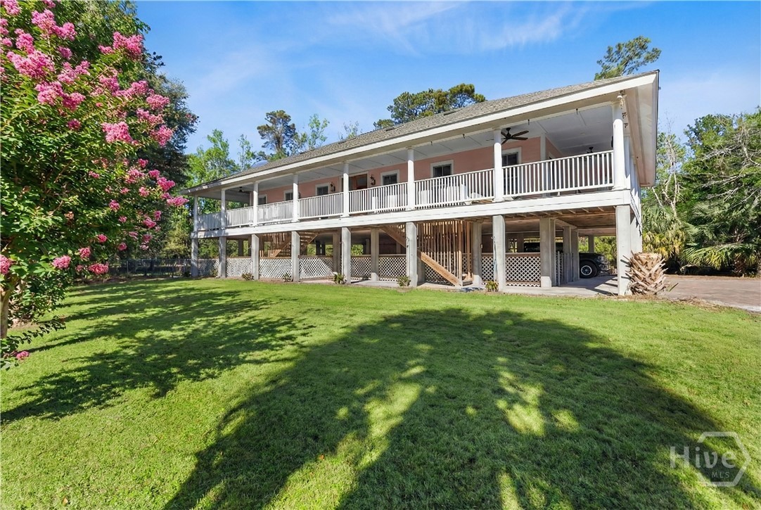 123 Oyster House Road Richmond Hill, GA 31324 - Photo 3 of 49 Front Photo Exterior - Grass Virtually Enhanced