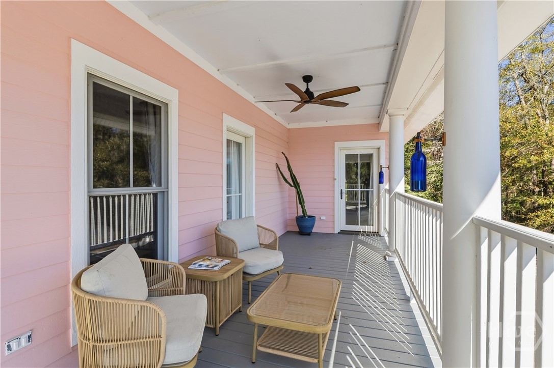 123 Oyster House Road Richmond Hill, GA 31324 - Photo 38 of 49 Wrap Around Porch