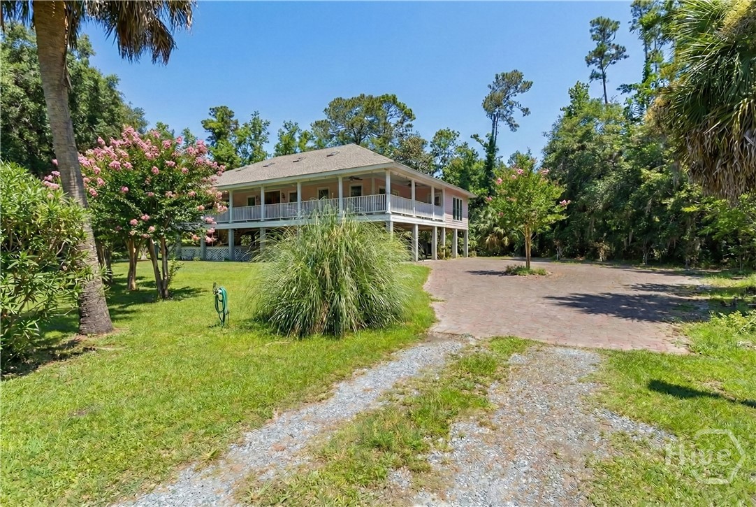 123 Oyster House Road Richmond Hill, GA 31324 - Photo 4 of 49 Driveway - Grass Virtually Enhanced