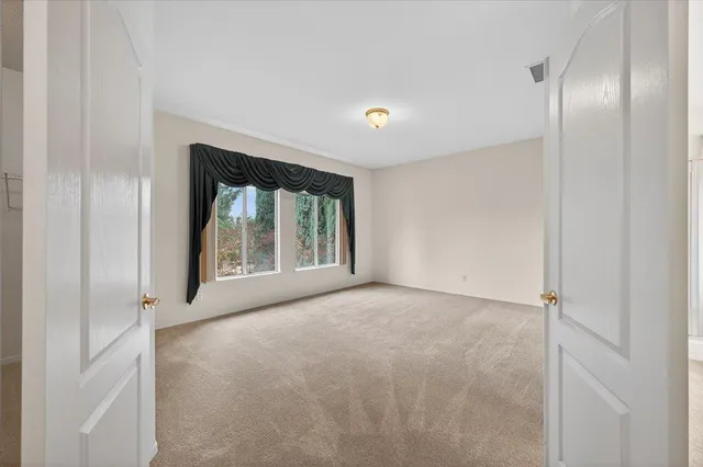 a view of a backyard with green space