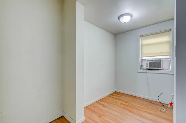 a view of a room that has a window in it