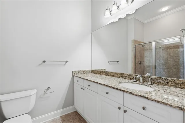 an aerial view of a house with yard swimming pool and outdoor seating