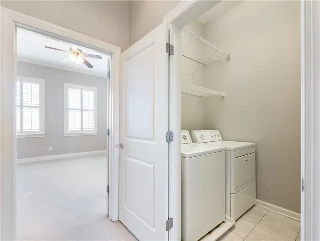 a view of a swimming pool with a bench in patio