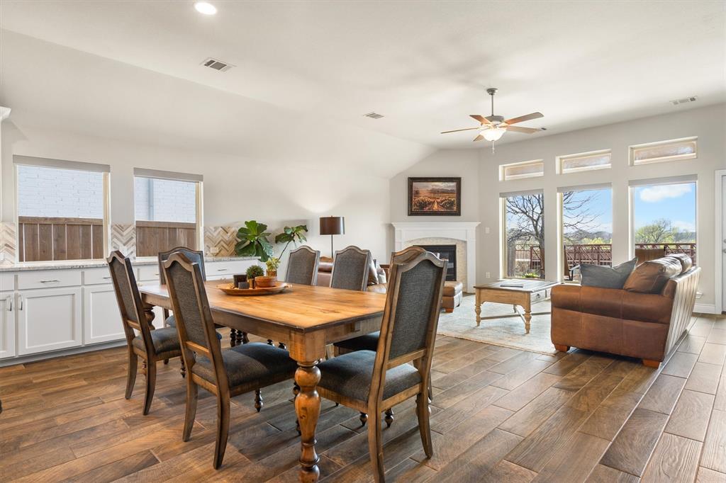 1647 Twistleaf Road Northlake, TX 76226 - Photo 15 of 39 a view of a dining room with furniture window and wooden floor