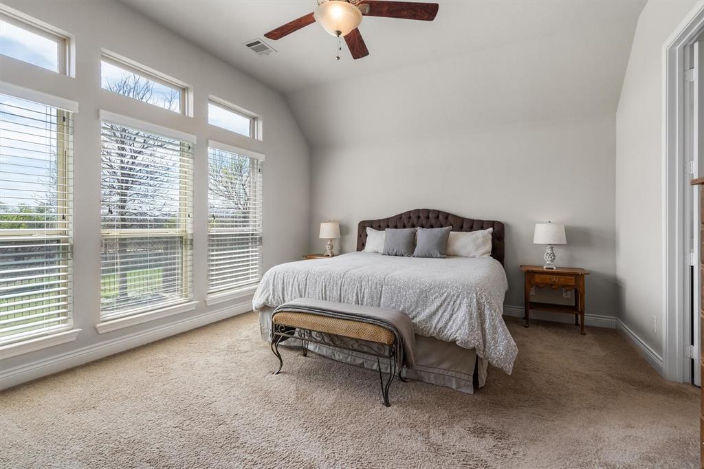 1647 Twistleaf Road Northlake, TX 76226 - Photo 19 of 39 a bedroom with a bed and a large window