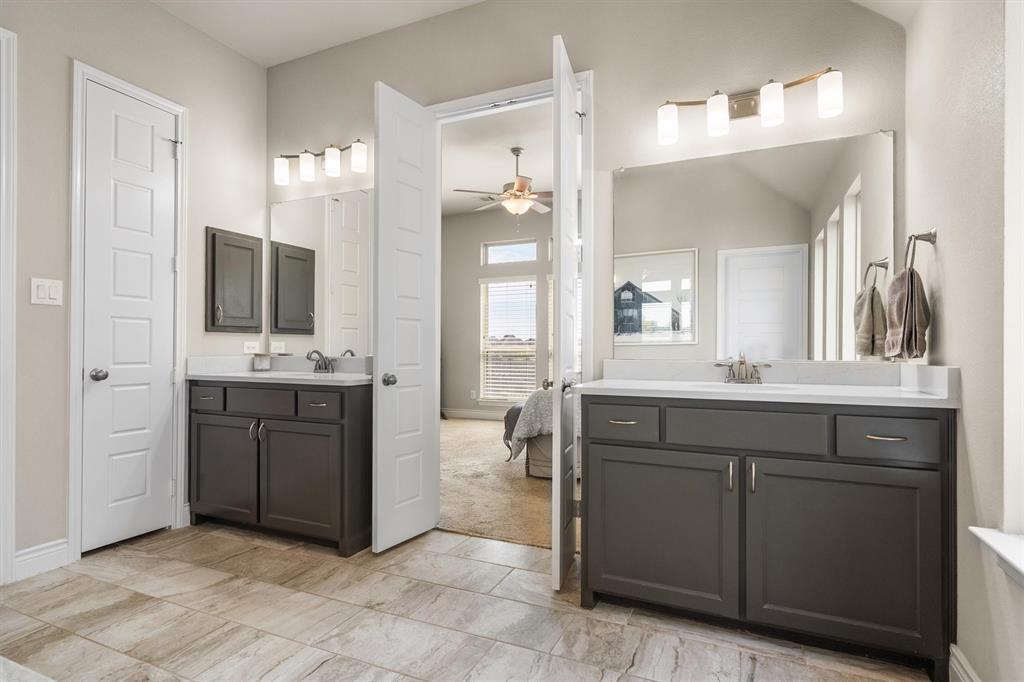 1647 Twistleaf Road Northlake, TX 76226 - Photo 23 of 39 a en suite bathroom with a granite countertop sink and a mirror