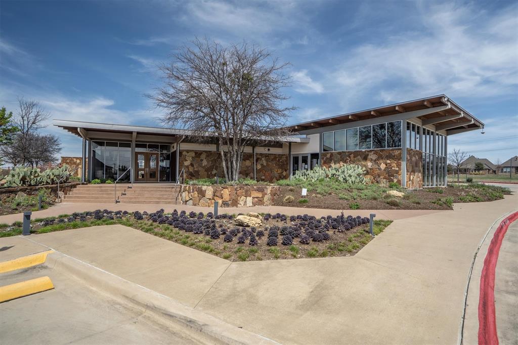 1647 Twistleaf Road Northlake, TX 76226 - Photo 37 of 39 a view of a house with snow on the road