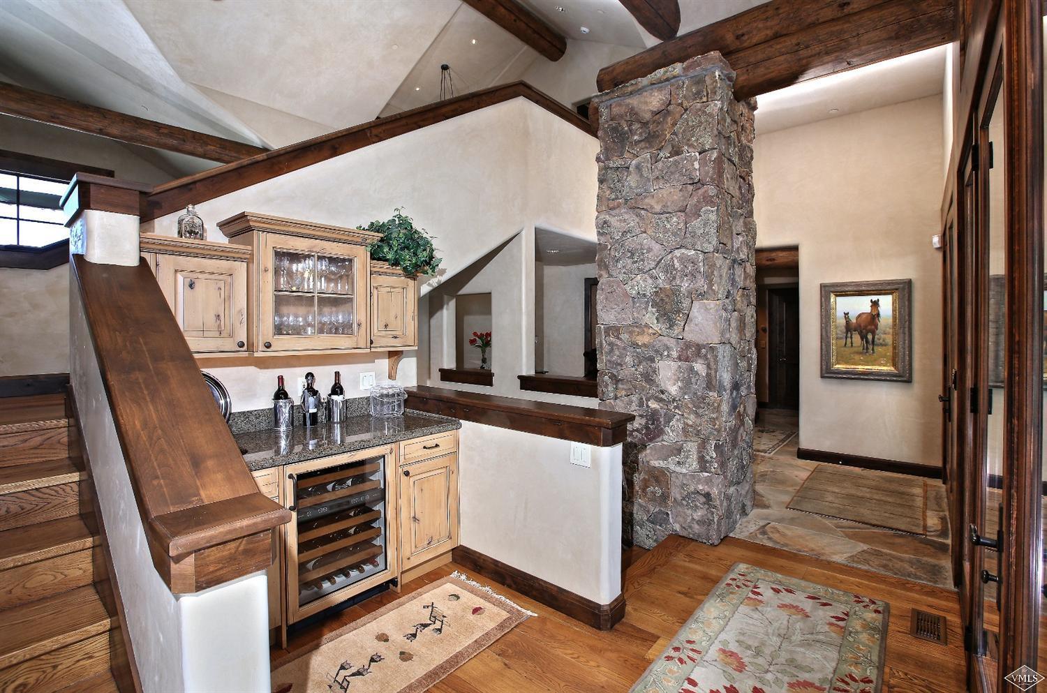 3508 Daybreak Ridge Road Avon, CO 81620 - Photo 11 of 25 a kitchen with stainless steel appliances granite countertop a stove a sink and a refrigerator