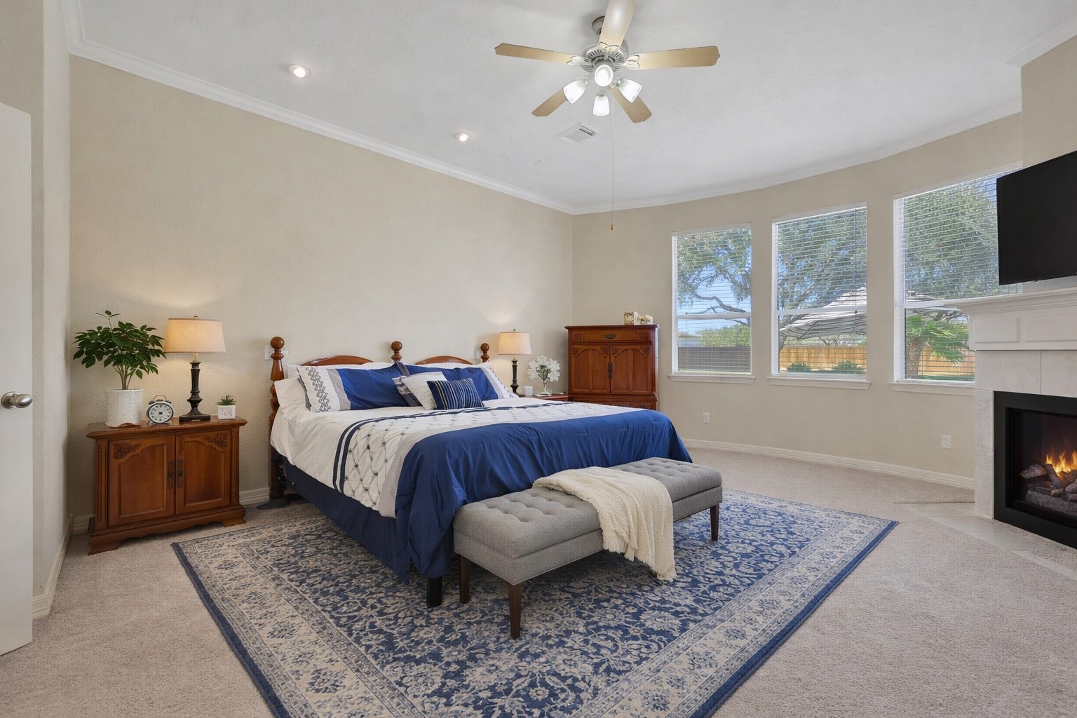 20810 East Cameron Ridge Drive Cypress, TX 77433 - Photo 17 of 48 a bedroom with a large bed and a tv