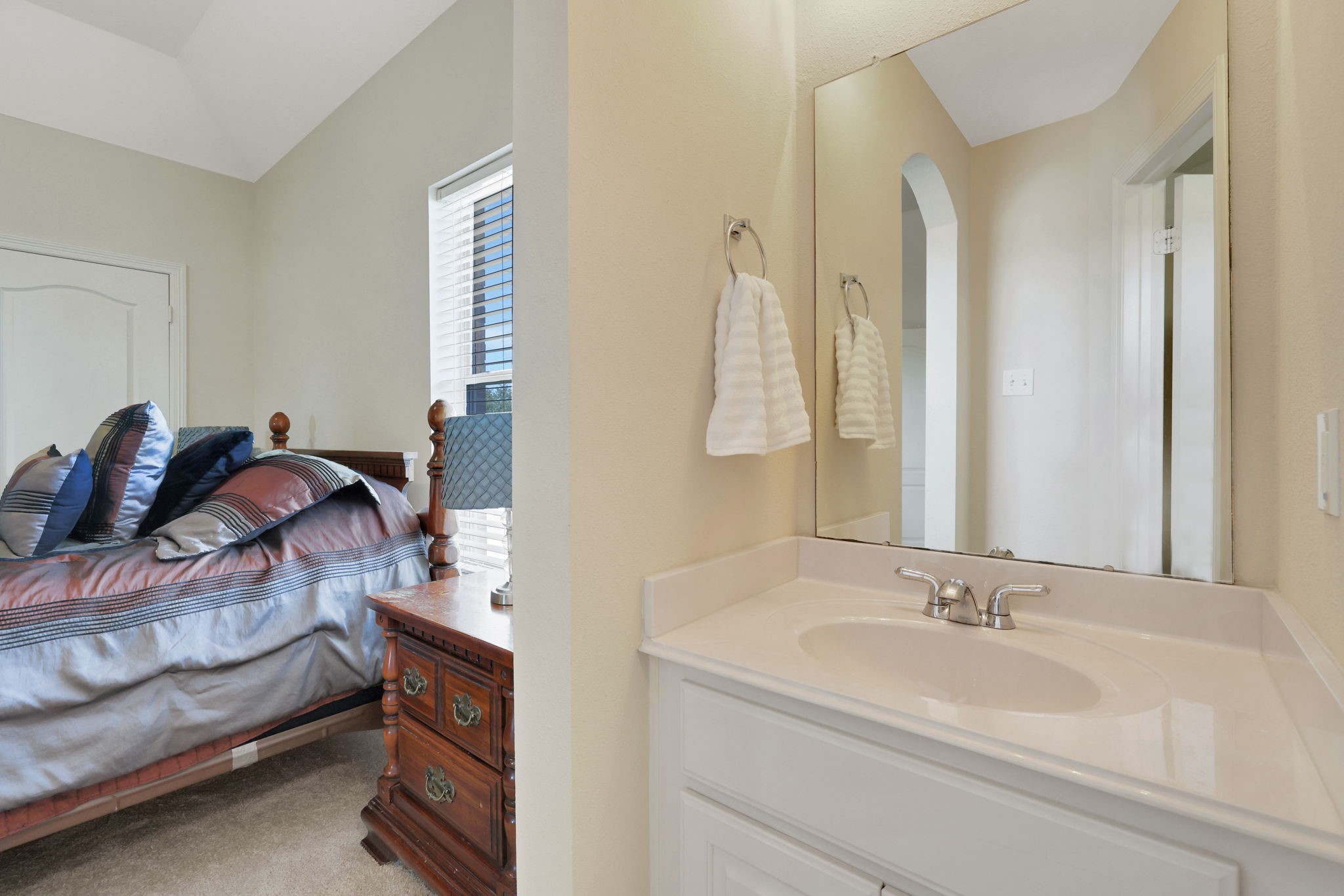20810 East Cameron Ridge Drive Cypress, TX 77433 - Photo 28 of 48 a bathroom with a sink and a mirror