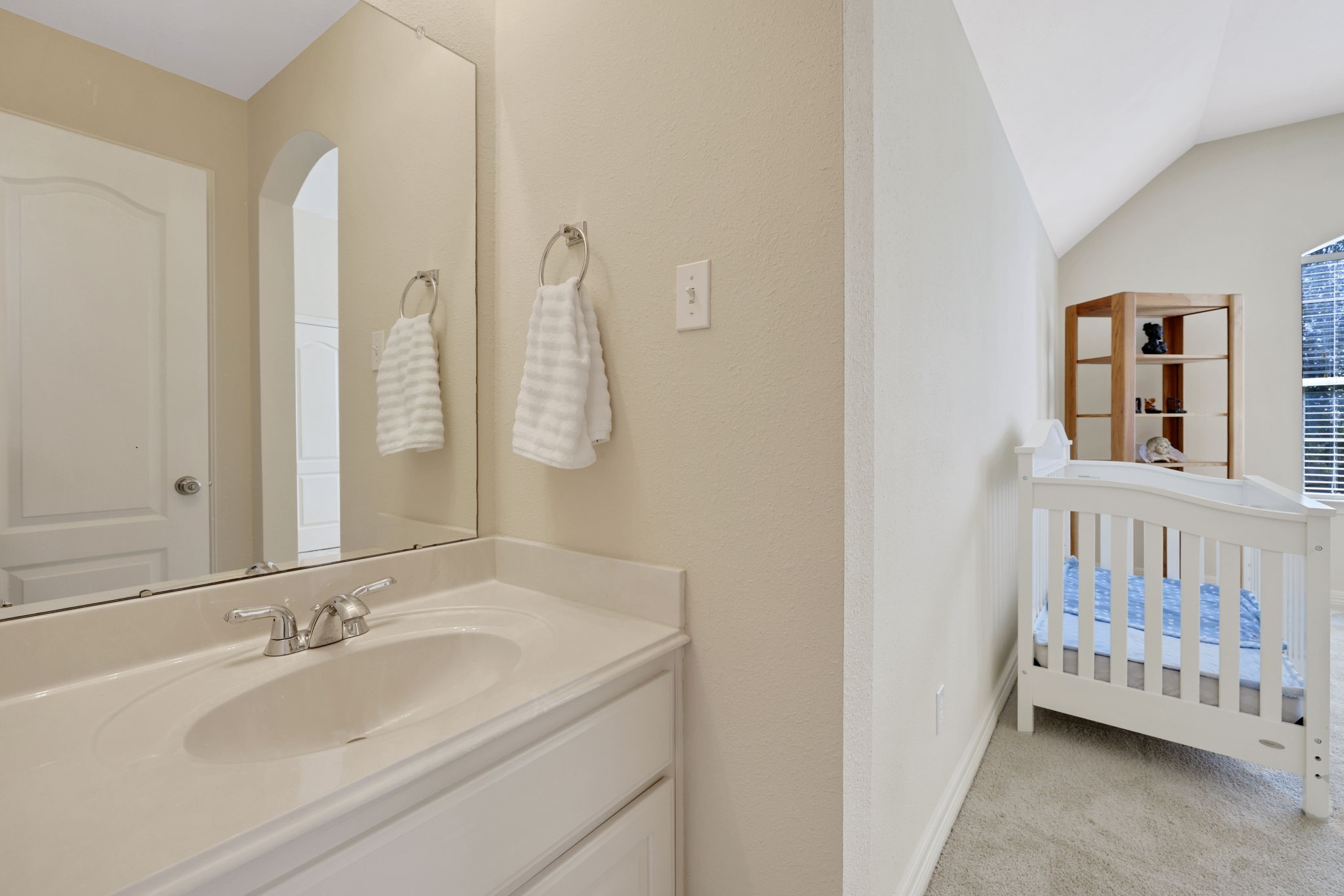 20810 East Cameron Ridge Drive Cypress, TX 77433 - Photo 29 of 48 a bathroom with a sink and a mirror