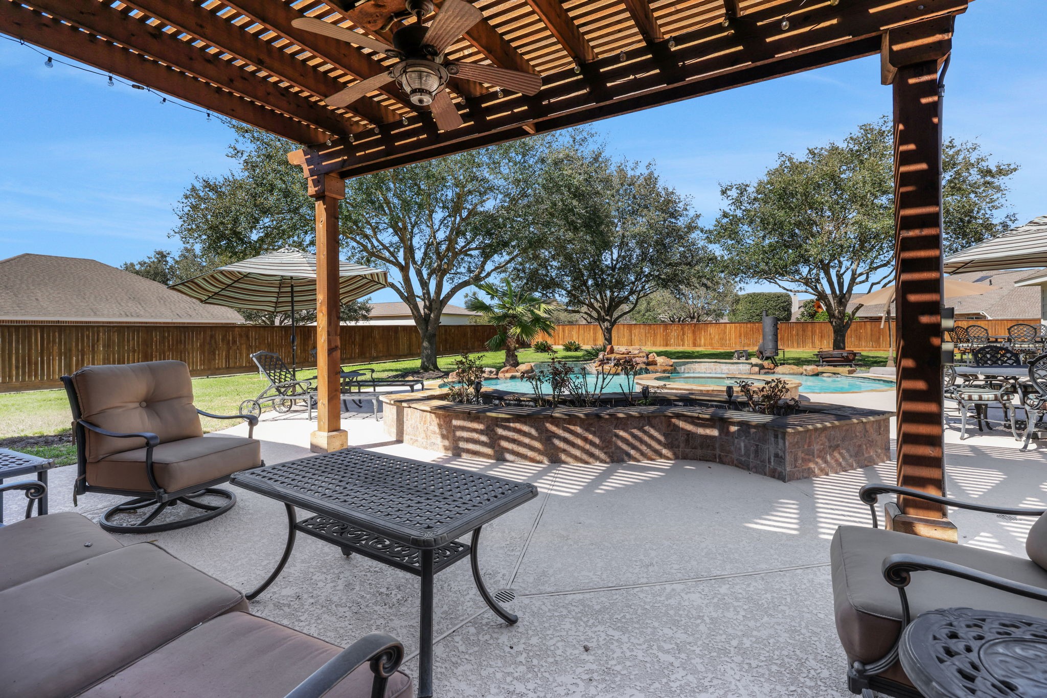 20810 East Cameron Ridge Drive Cypress, TX 77433 - Photo 35 of 48 a view of a chairs and tables in the patio