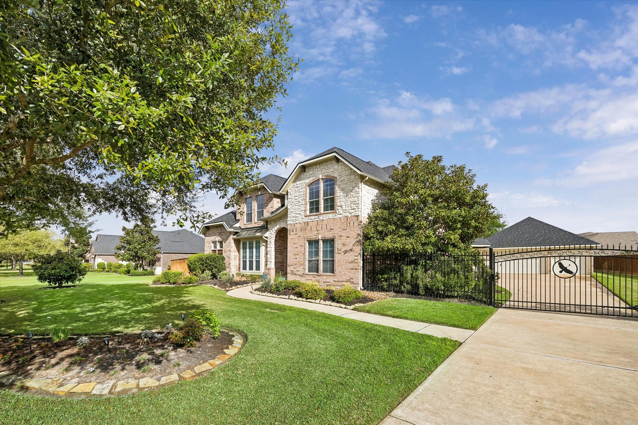 20810 East Cameron Ridge Drive Cypress, TX 77433 - Photo 4 of 48 front view of a house with a yard