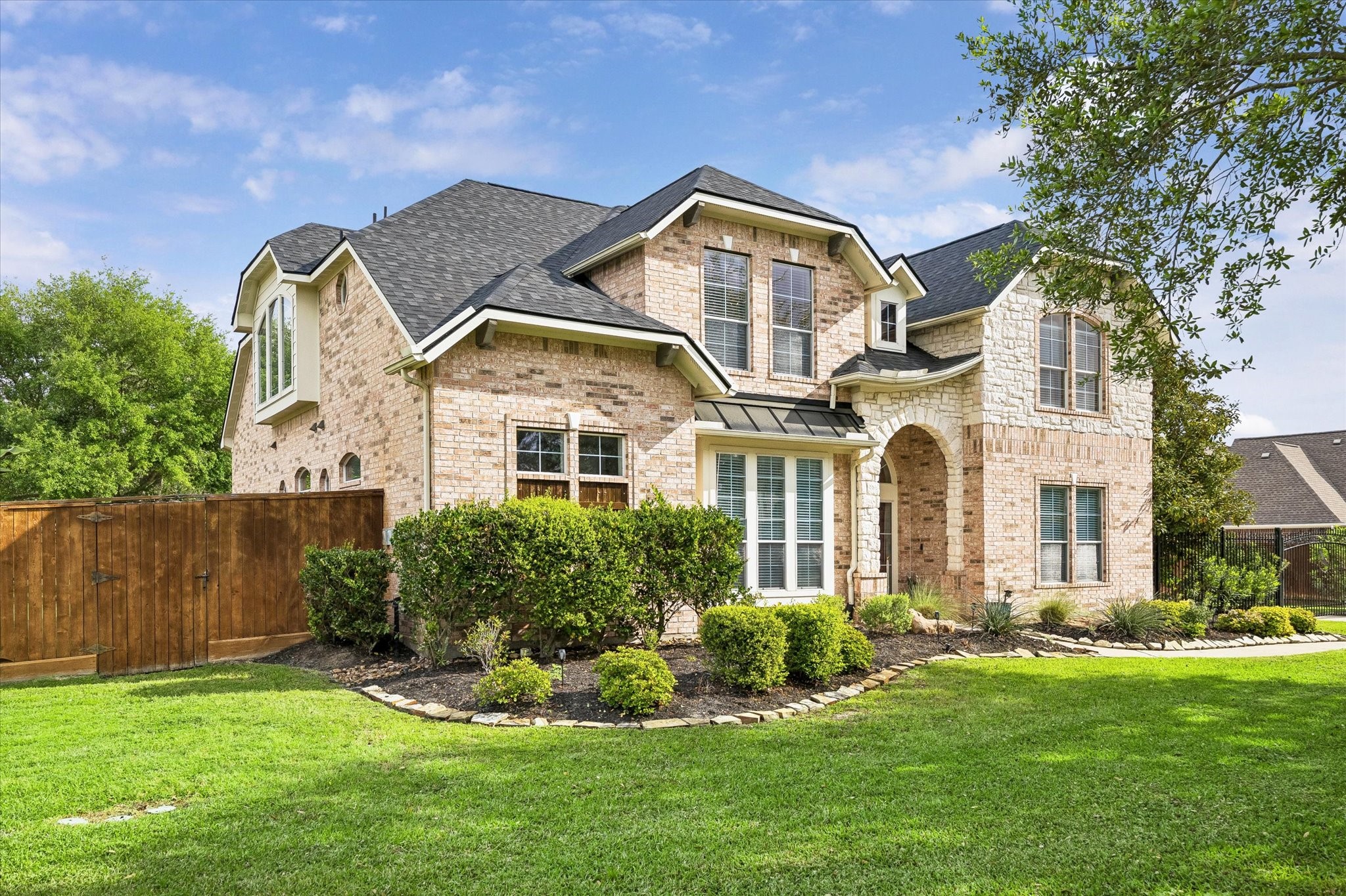 20810 East Cameron Ridge Drive Cypress, TX 77433 - Photo 44 of 48 a front view of a house with a yard