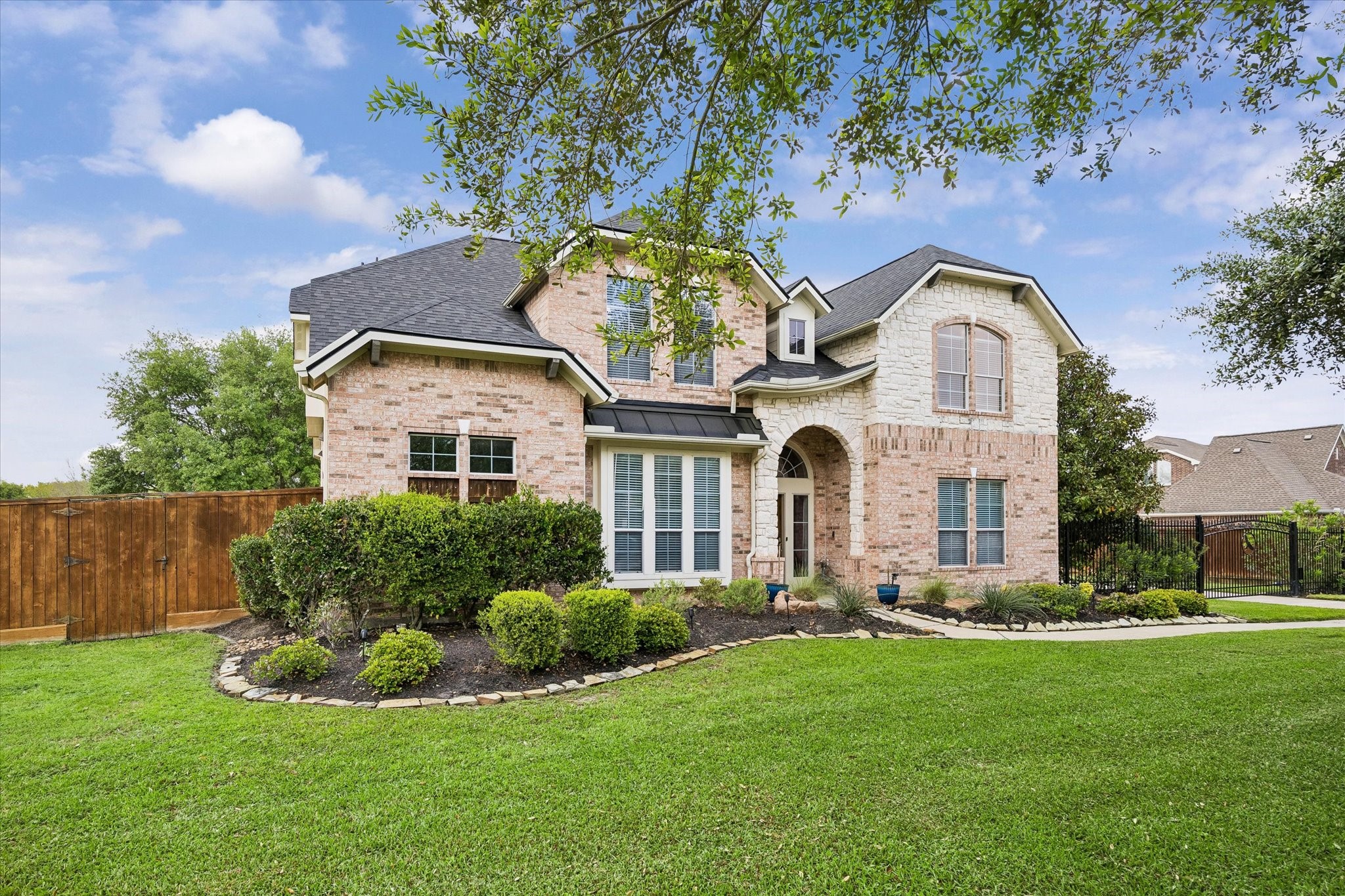 20810 East Cameron Ridge Drive Cypress, TX 77433 - Photo 46 of 48 a front view of a house with a yard