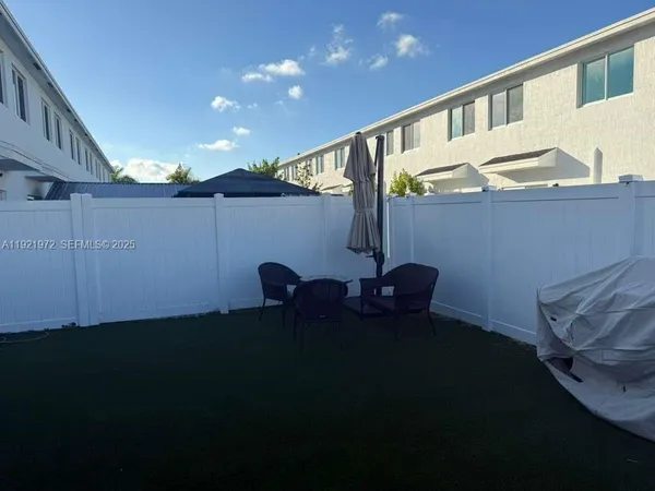 a view of outdoor space with seating area