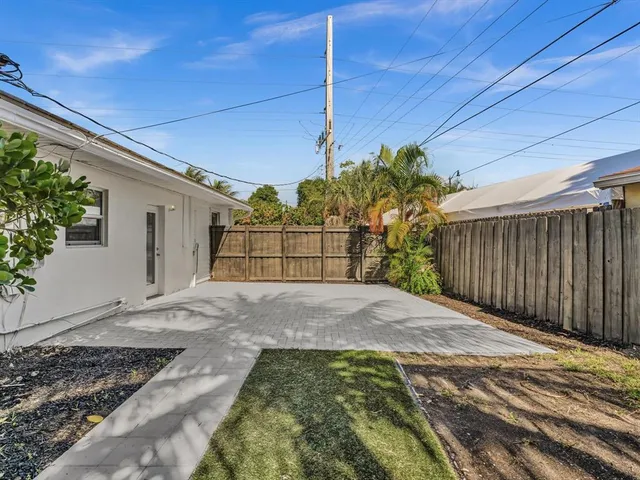 a view of backyard with green space