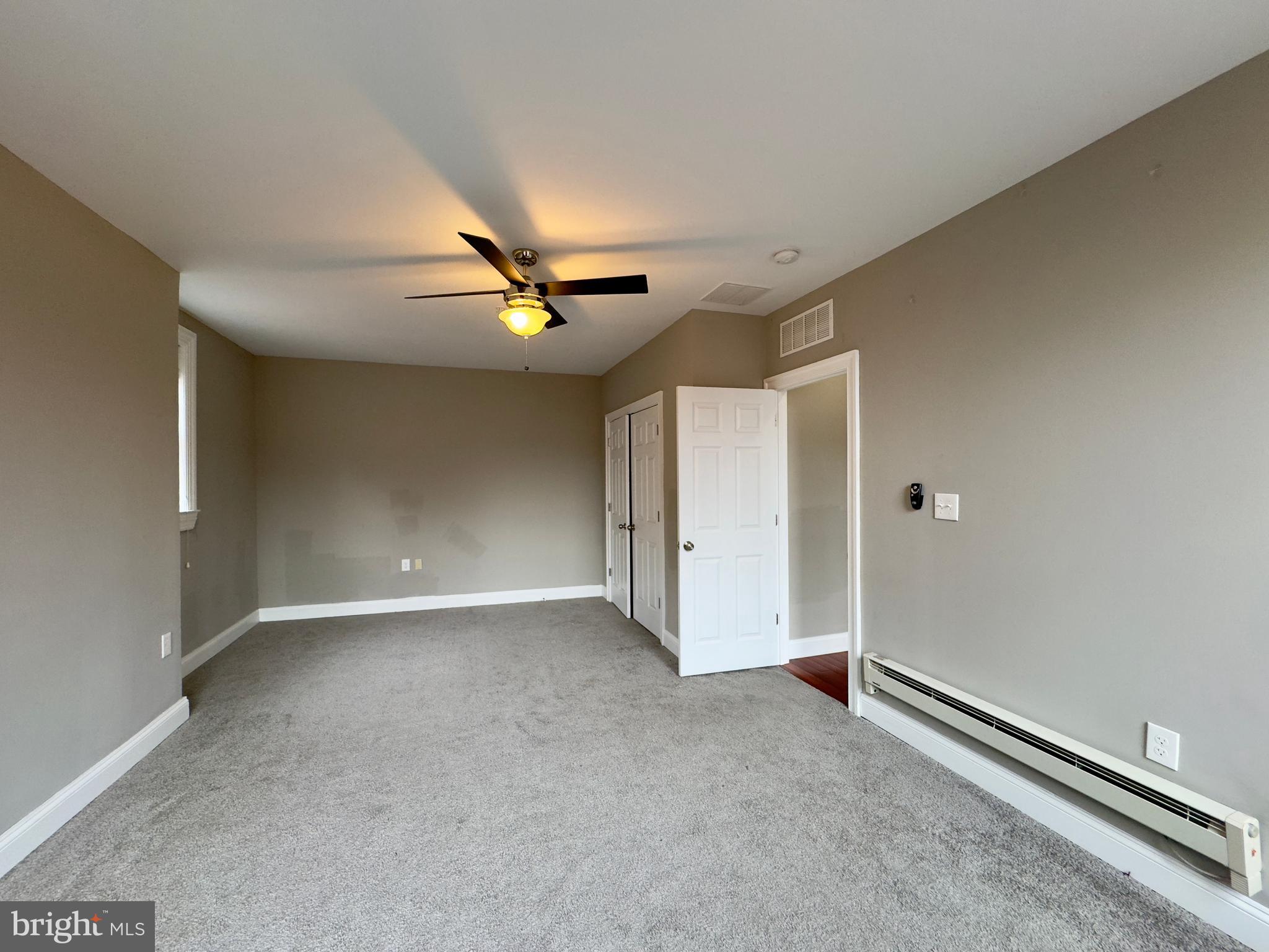 803 Cathedral Street, Unit 8 Baltimore, MD 21201 - Photo 16 of 16 a view of an empty room