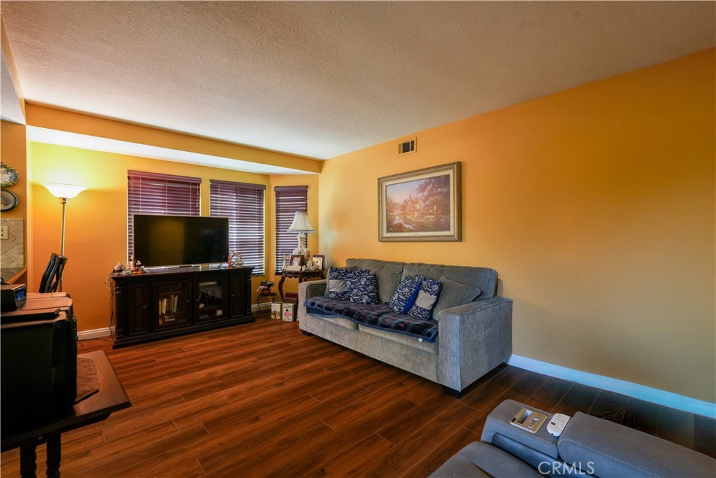 24422 Cielo Laguna Niguel, CA 92677 - Photo 22 of 23 a living room with furniture and a flat screen tv