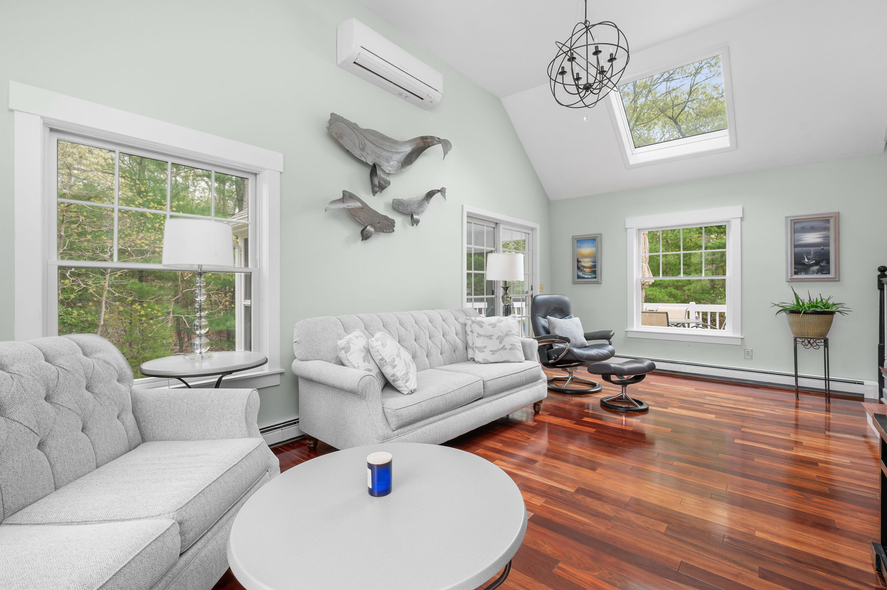 50 Hyde Park Centerville, MA 02632 - Photo 14 of 38 a living room with furniture and a large window