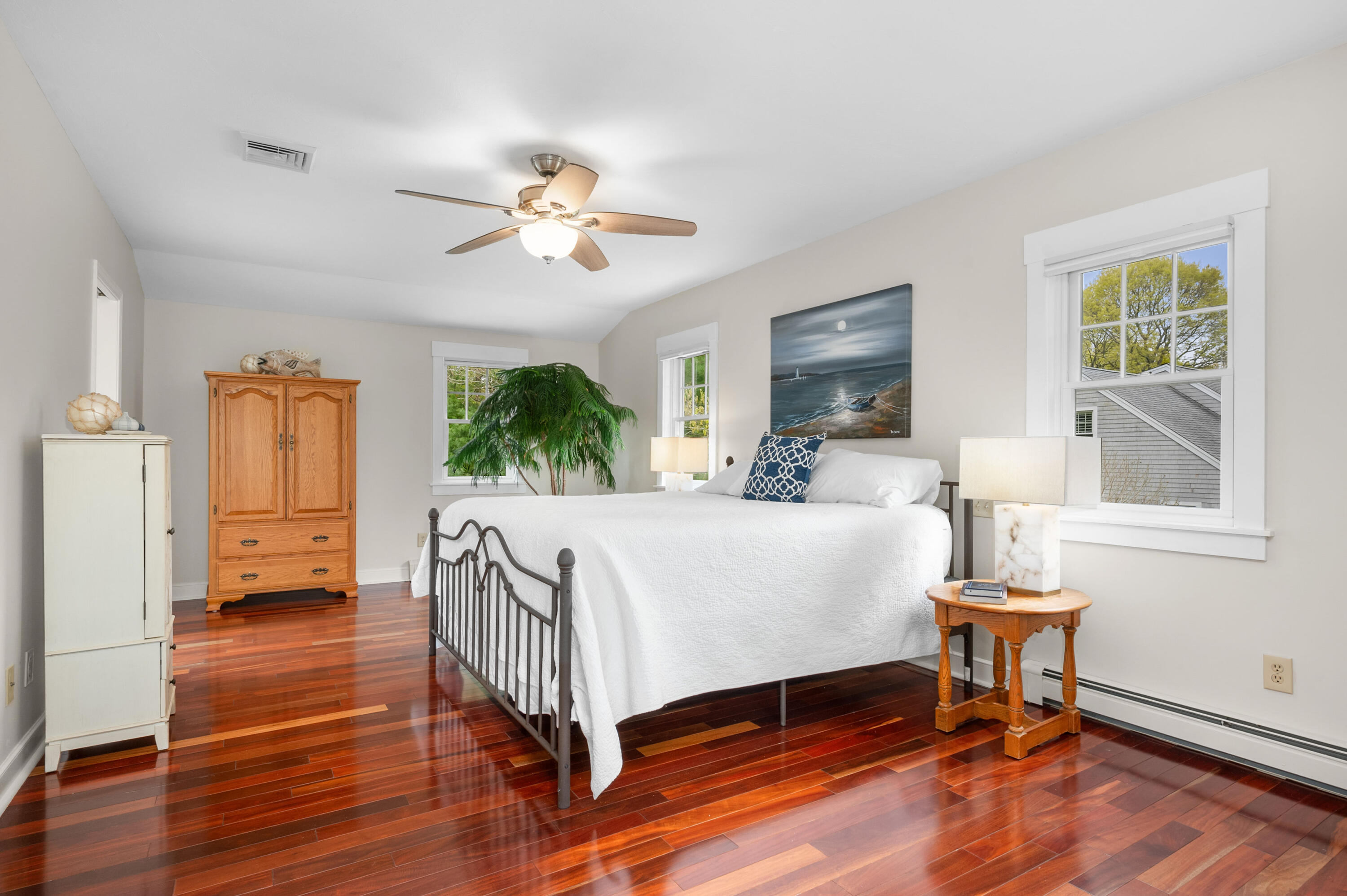 50 Hyde Park Centerville, MA 02632 - Photo 22 of 38 a living room with a bed furniture and a window