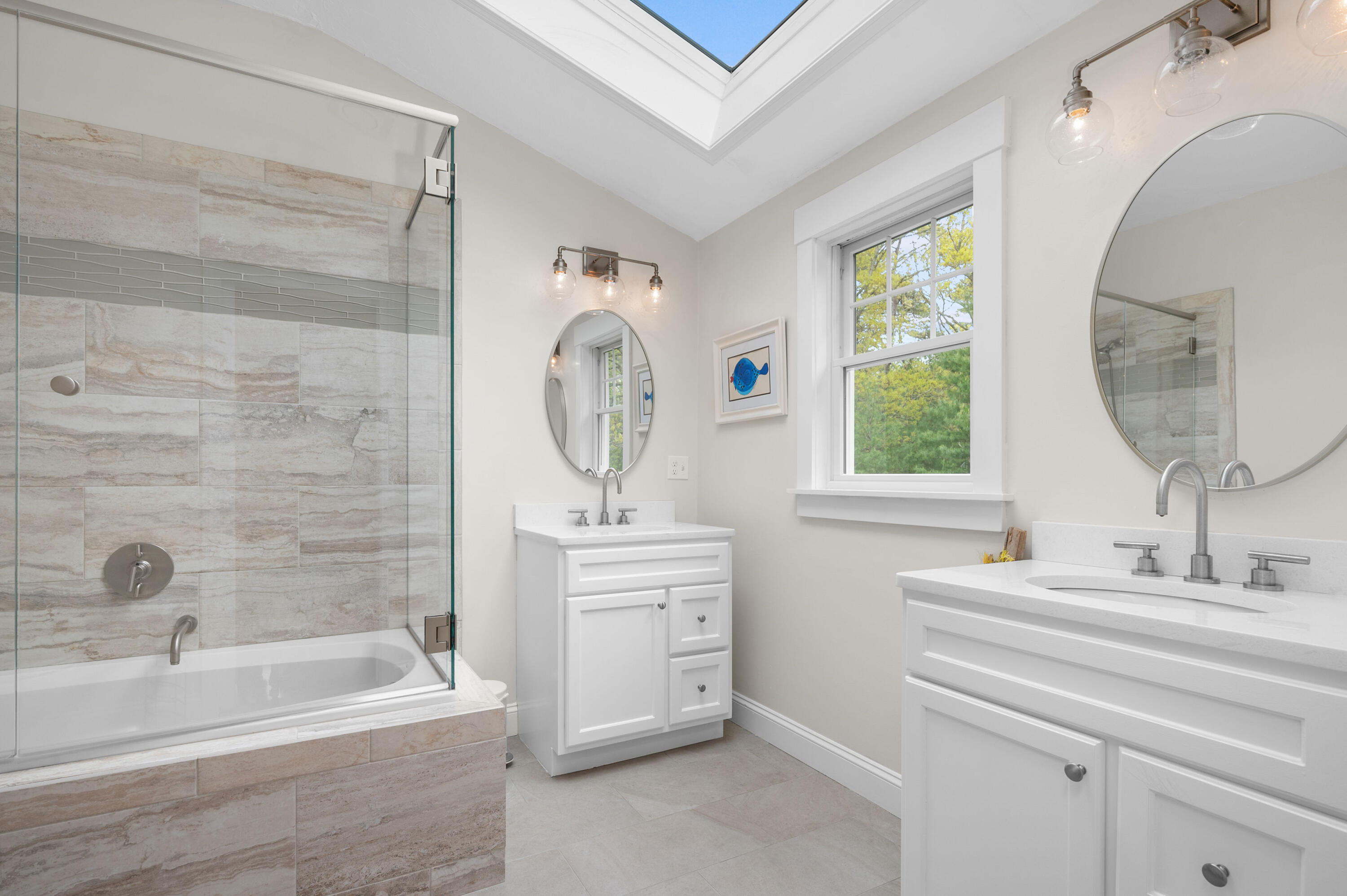 50 Hyde Park Centerville, MA 02632 - Photo 24 of 38 a bathroom with a bathtub sink and mirror