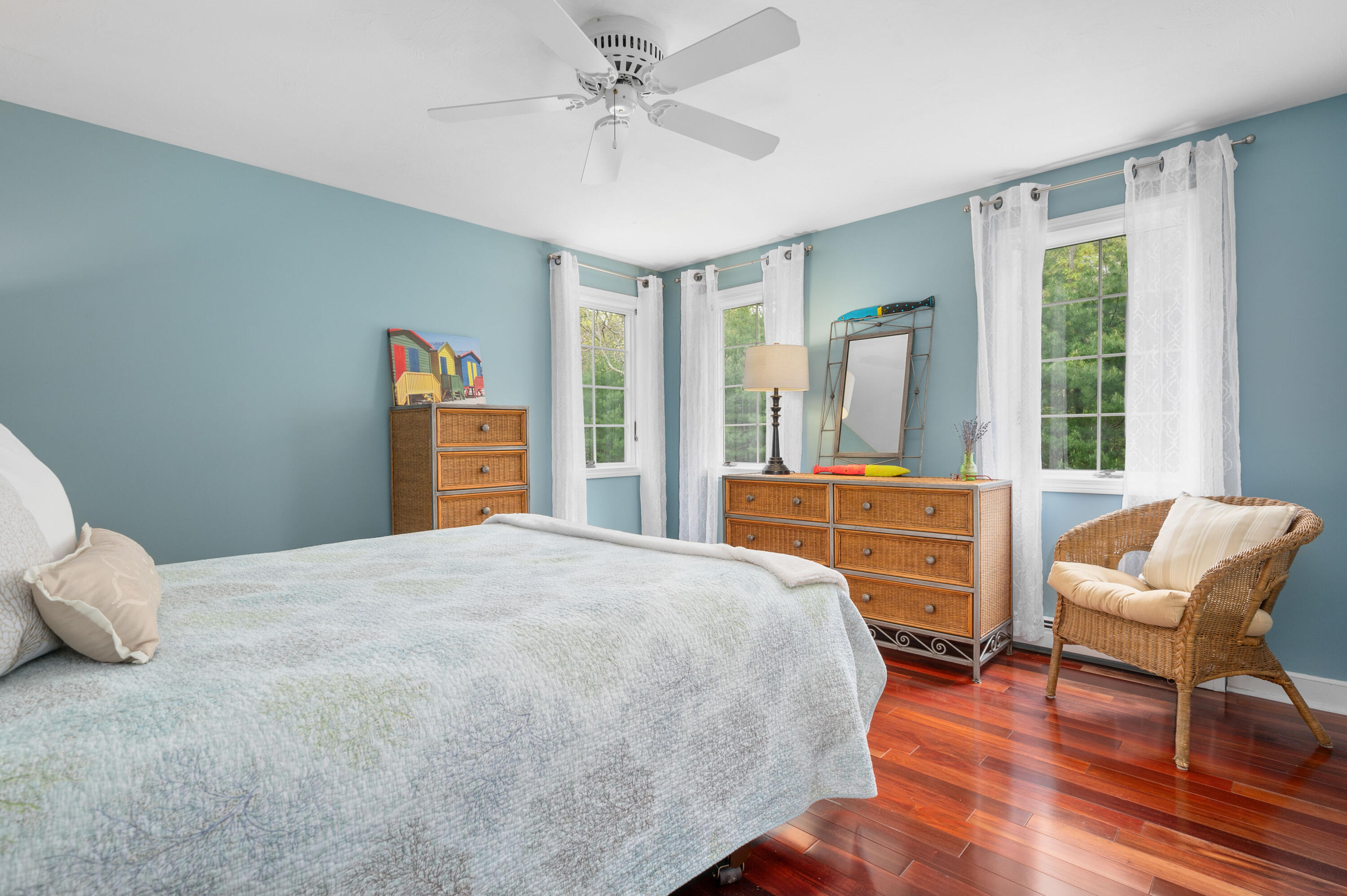 50 Hyde Park Centerville, MA 02632 - Photo 25 of 38 a bedroom with a bed and wooden floor