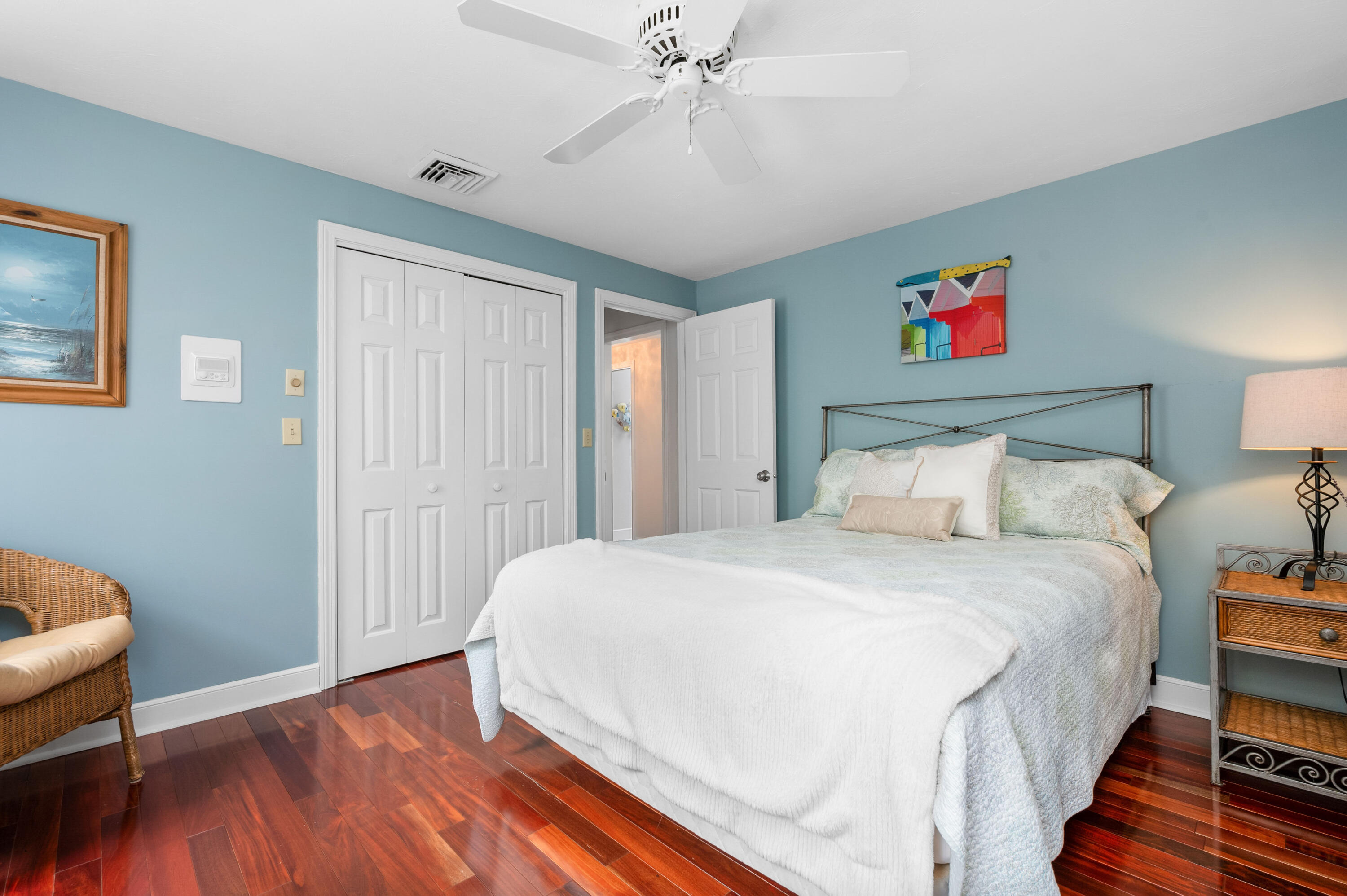 50 Hyde Park Centerville, MA 02632 - Photo 26 of 38 a bedroom with a bed and wooden floor