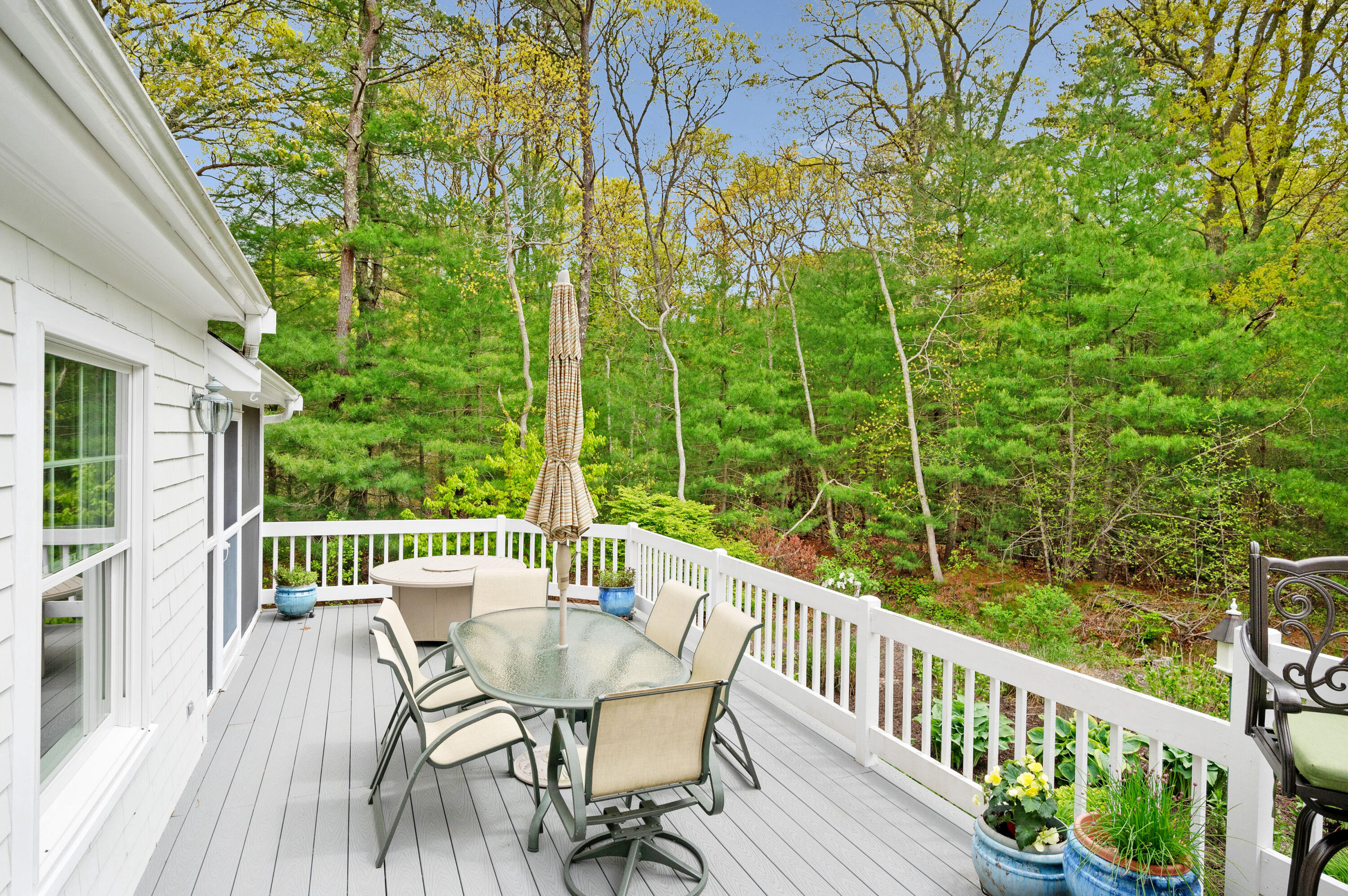 50 Hyde Park Centerville, MA 02632 - Photo 29 of 38 a view of a chair and table on the deck