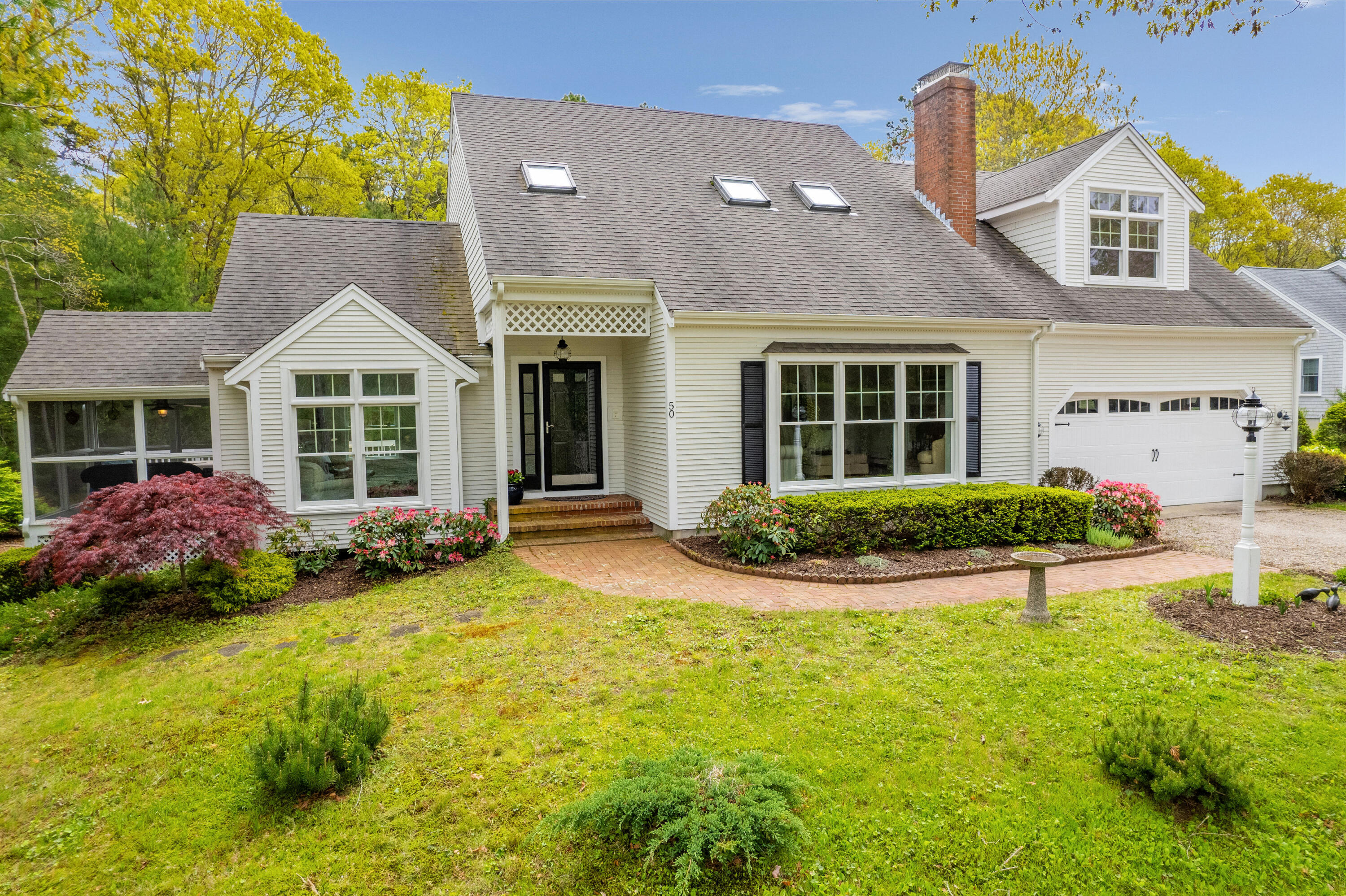 50 Hyde Park Centerville, MA 02632 - Photo 36 of 38 a view of an house with backyard and swimming pool