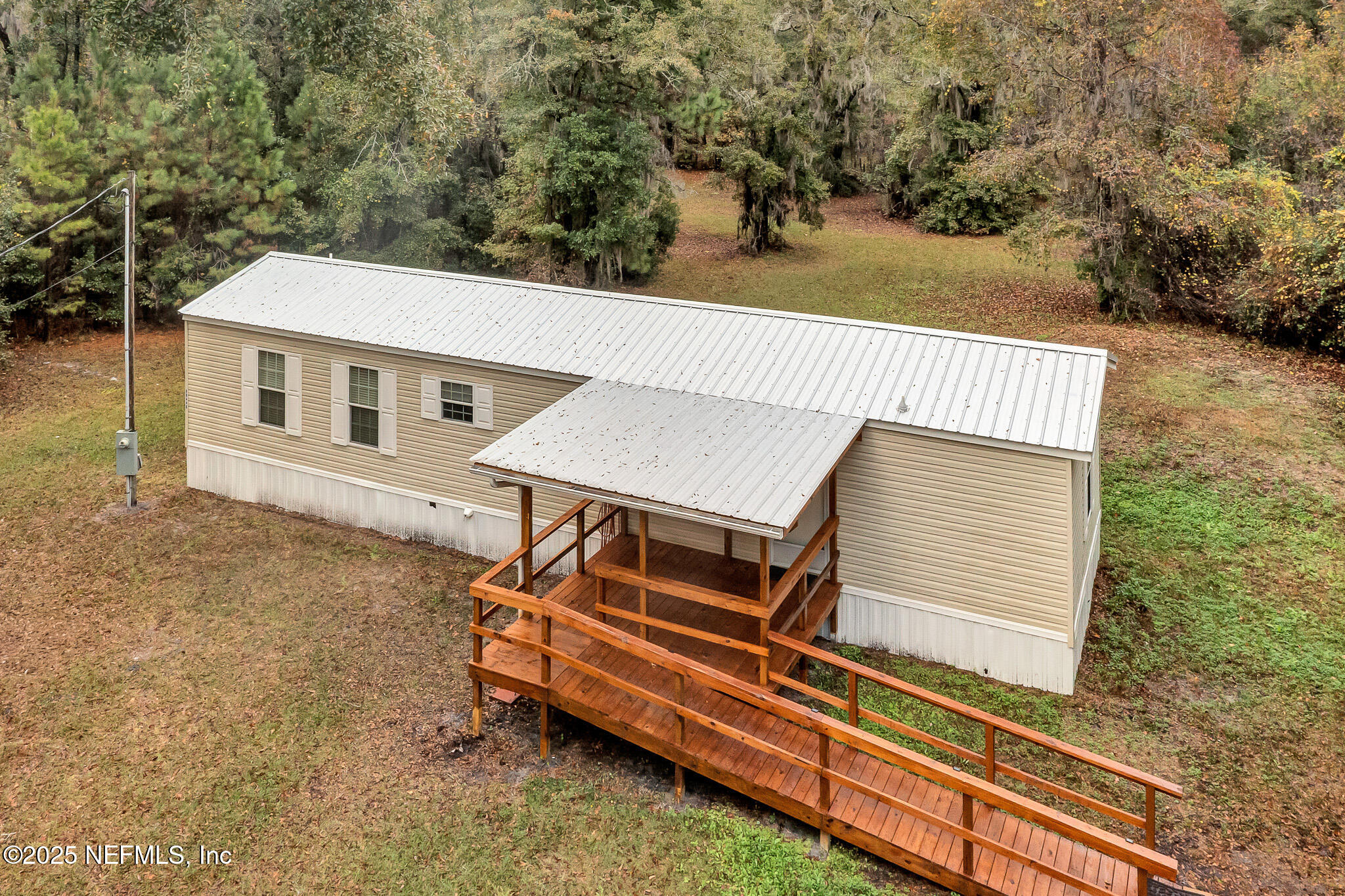 86446 Peeples Road Yulee, FL 32097 - Photo 12 of 42 a house view with a outdoor space